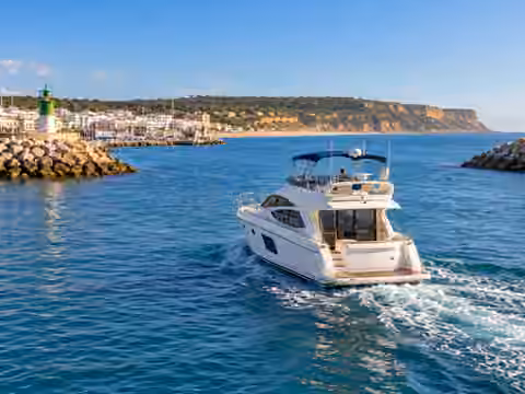 Illustrative image of a boat navigating near Barbate