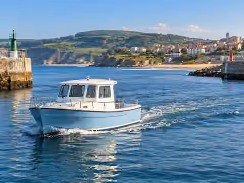 Illustrative image of a boat navigating near Cantabria