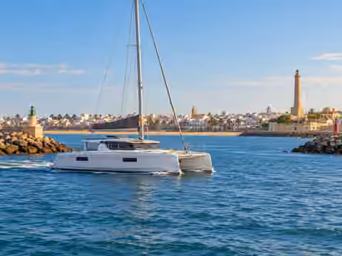 Illustrative image of a boat navigating near Chipiona