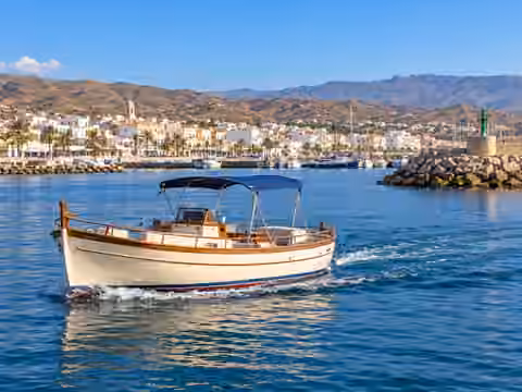 Illustrative image of a boat navigating near Vera