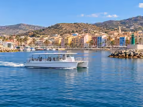Illustrative image of a boat navigating near Villajoyosa
