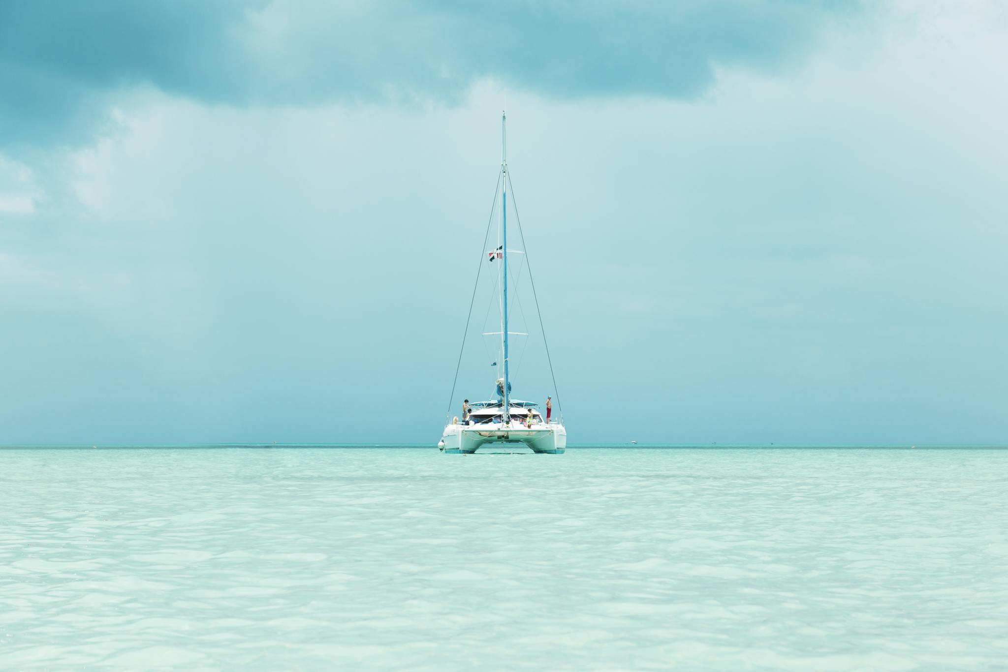 Cenizas al Mar en Cádiz 19 a serene image of a catamaran sailing in the turquoise waters of punta cana dominican republic. 2613970