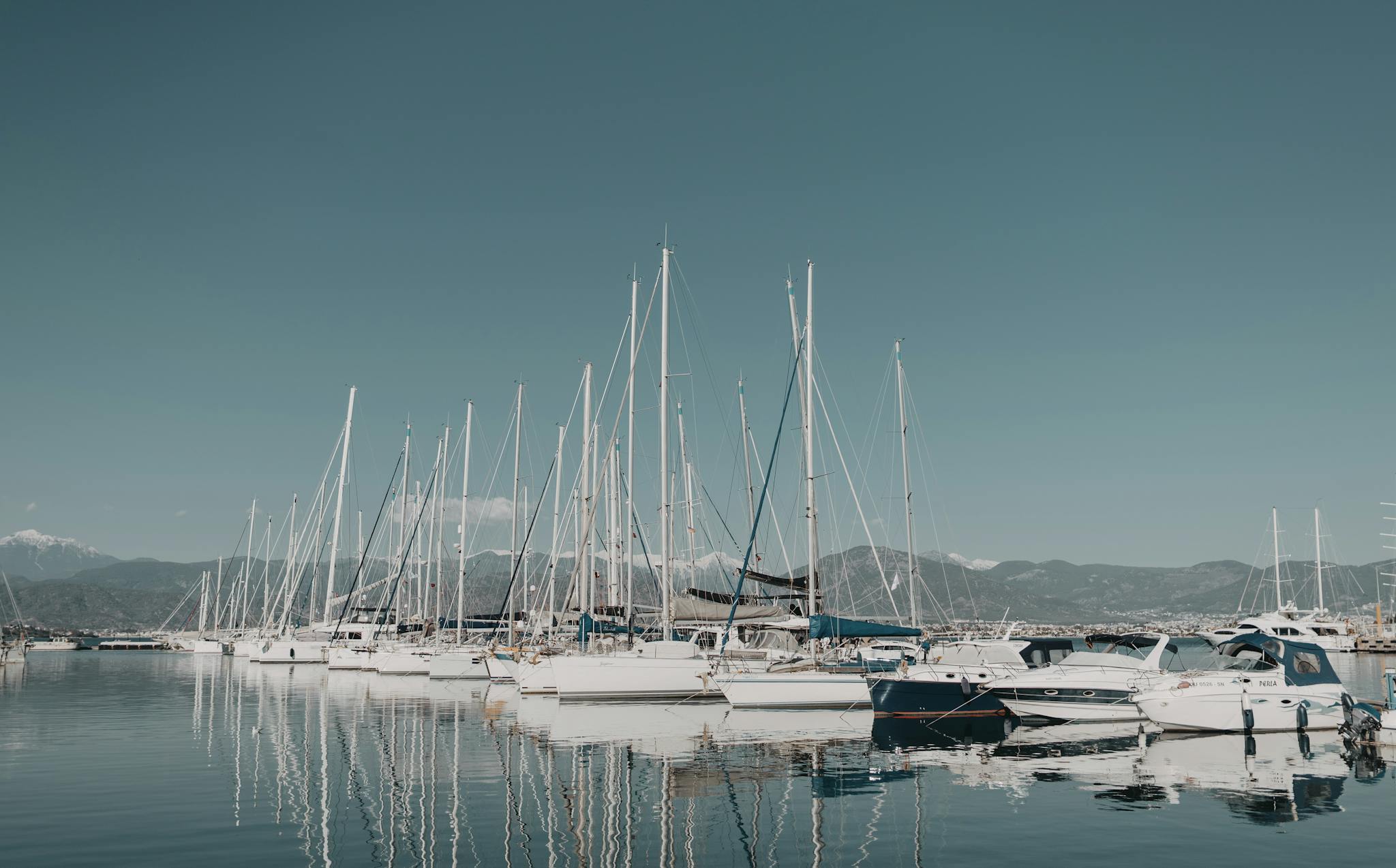 Cenizas al Mar en Cádiz 20 a serene view of sailboats docked at fethiye marina on a bright summer day. 3851909